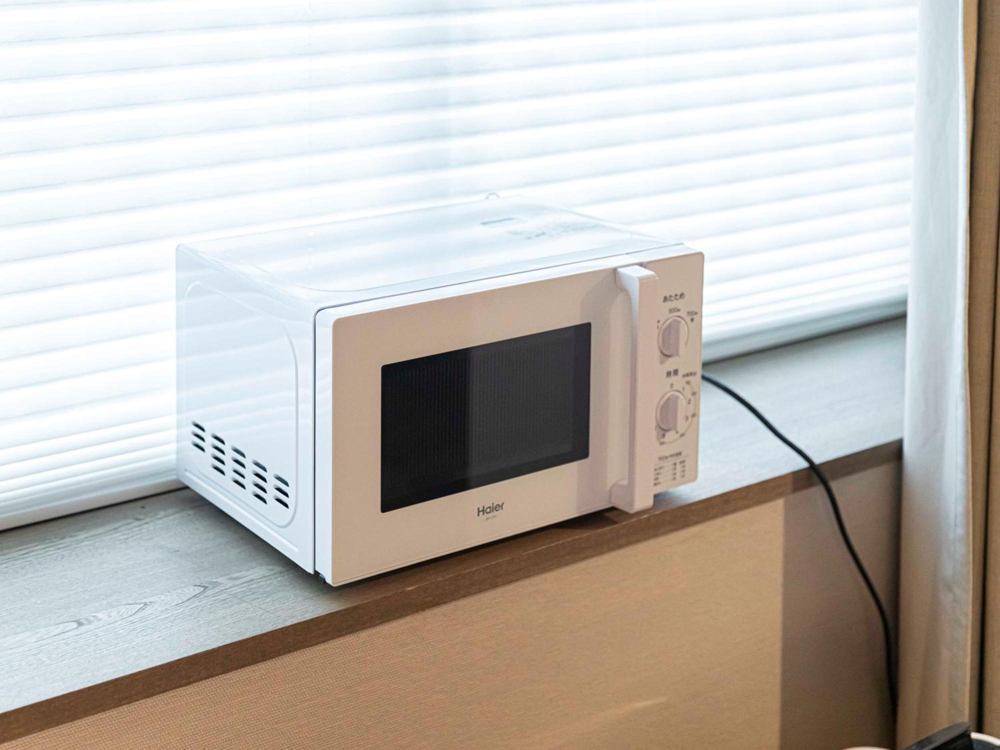 Good Nature Hotel Quioto Quarto foto A microwave oven